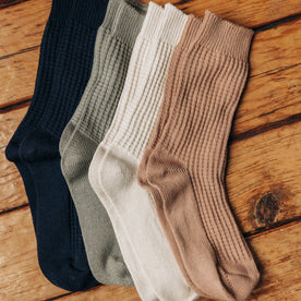 editorial image of socks laid out for The Waffle Sock in Navy