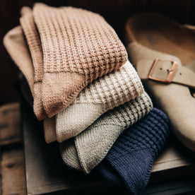 editorial image of folded socks for The Waffle Sock in Navy