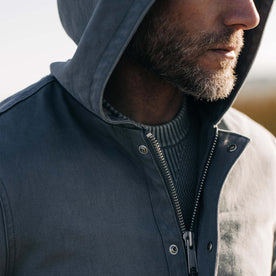 fit model wearing The Workhorse Hoodie in Gravel Boss Duck with hood up