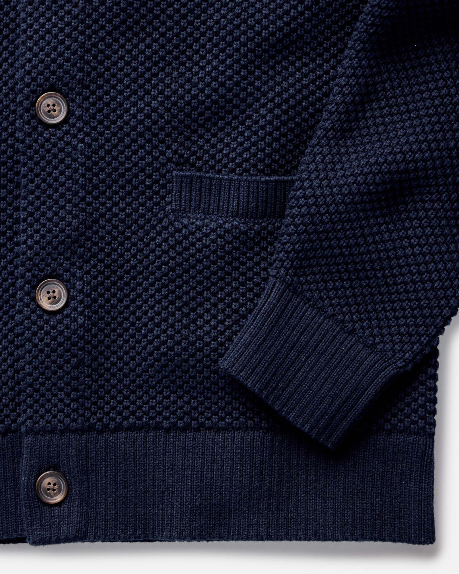 fit model rocking the The Crawford Sweater in Navy in a car, Knits by Taylor Stitch