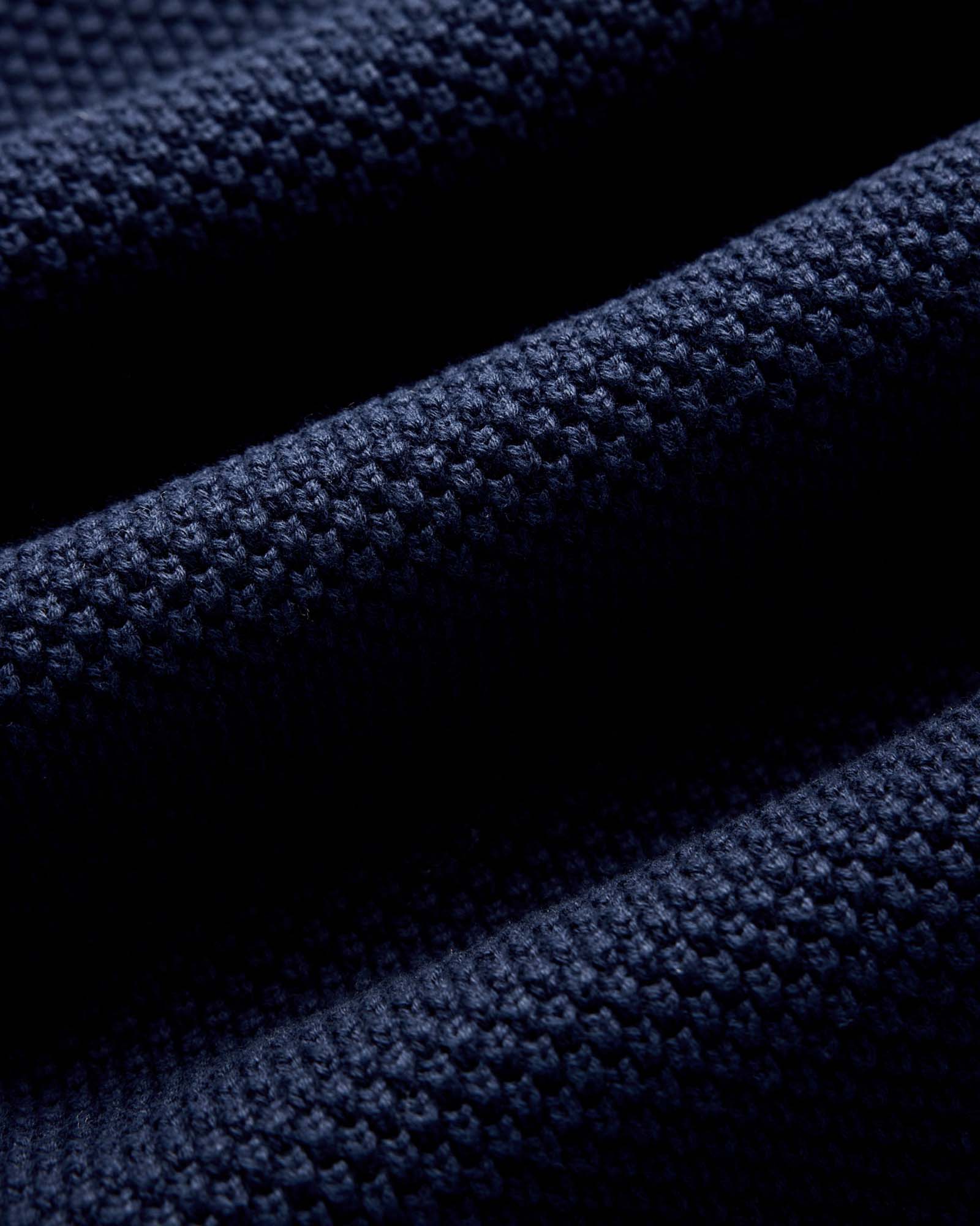 material shot of the sleeves on The Crawford Sweater in Navy, Knits by Taylor Stitch