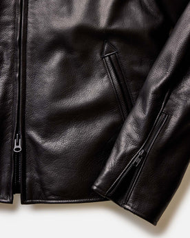material shot of the zipper on The Moto Jacket in Black Steerhide, Outerwear by Taylor Stitch