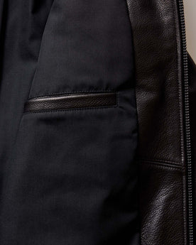 material shot of the collar on The Moto Jacket in Black Steerhide, Outerwear by Taylor Stitch