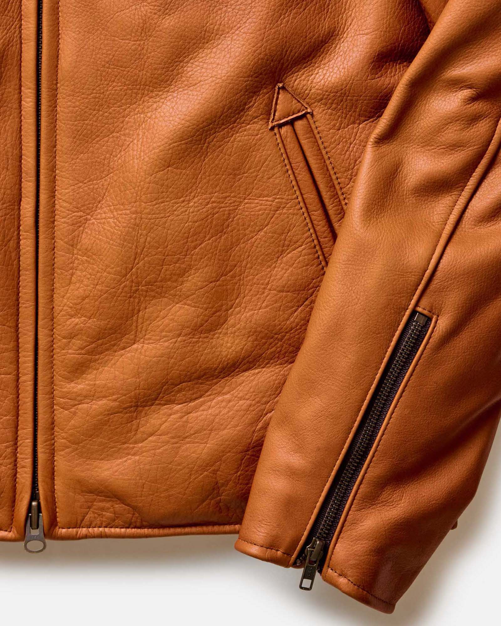 fit model showing the back of The Moto Jacket in Whiskey Steerhide, Outerwear by Taylor Stitch