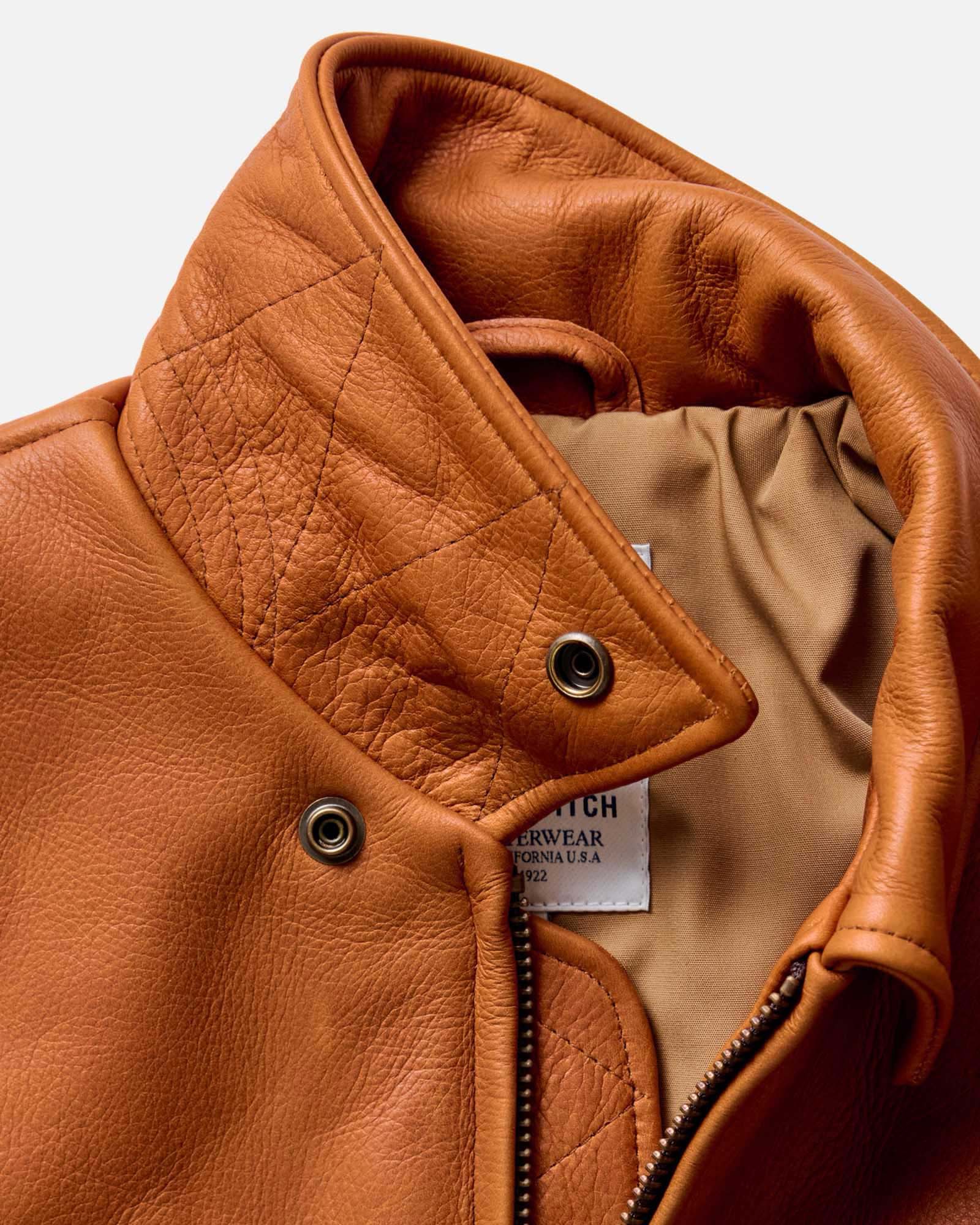 material shot of the collar on The Moto Jacket in Whiskey Steerhide, Outerwear by Taylor Stitch