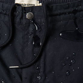 material shot of water on front fly and waistband