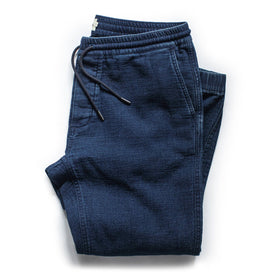 flatlay of pants, folded