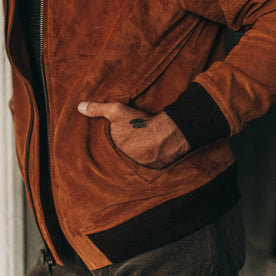 fit model wearing The Bomber Jacket in Whiskey Suede, hand in side pocket