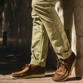 fit model wearing The Camp Pant in Olive Herringbone, cuffed with shoes