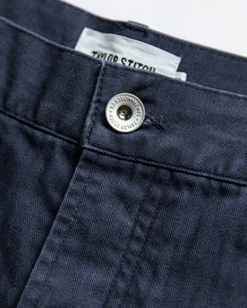 material shot of button, Bottoms by Taylor Stitch