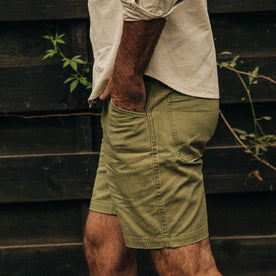 fit model wearing The Camp Short in Olive Herringbone, hand in pocket