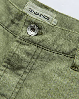 material shot of button, Bottoms by Taylor Stitch