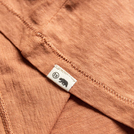 material shot of logo on bottom