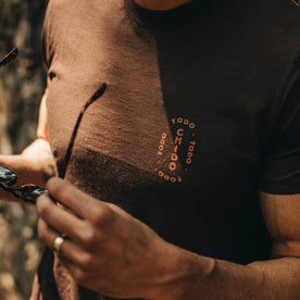 fit model wearing The Cotton Hemp Tee in Espresso Todo Chido, chest cropped shot