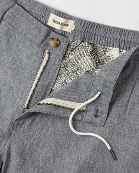 material shot of drawstring and map interior, Bottoms by Taylor Stitch