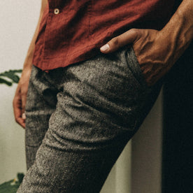 fit model wearing The Easy Pant in Espresso Linen, hand in pocket, cropped shot