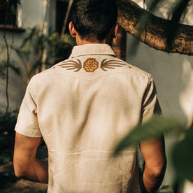 fit model wearing The Embroidered Short Sleeve Western in Natural, back shot