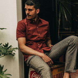 fit model wearing The Havana in Rusted Floral Jacquard, sitting on box