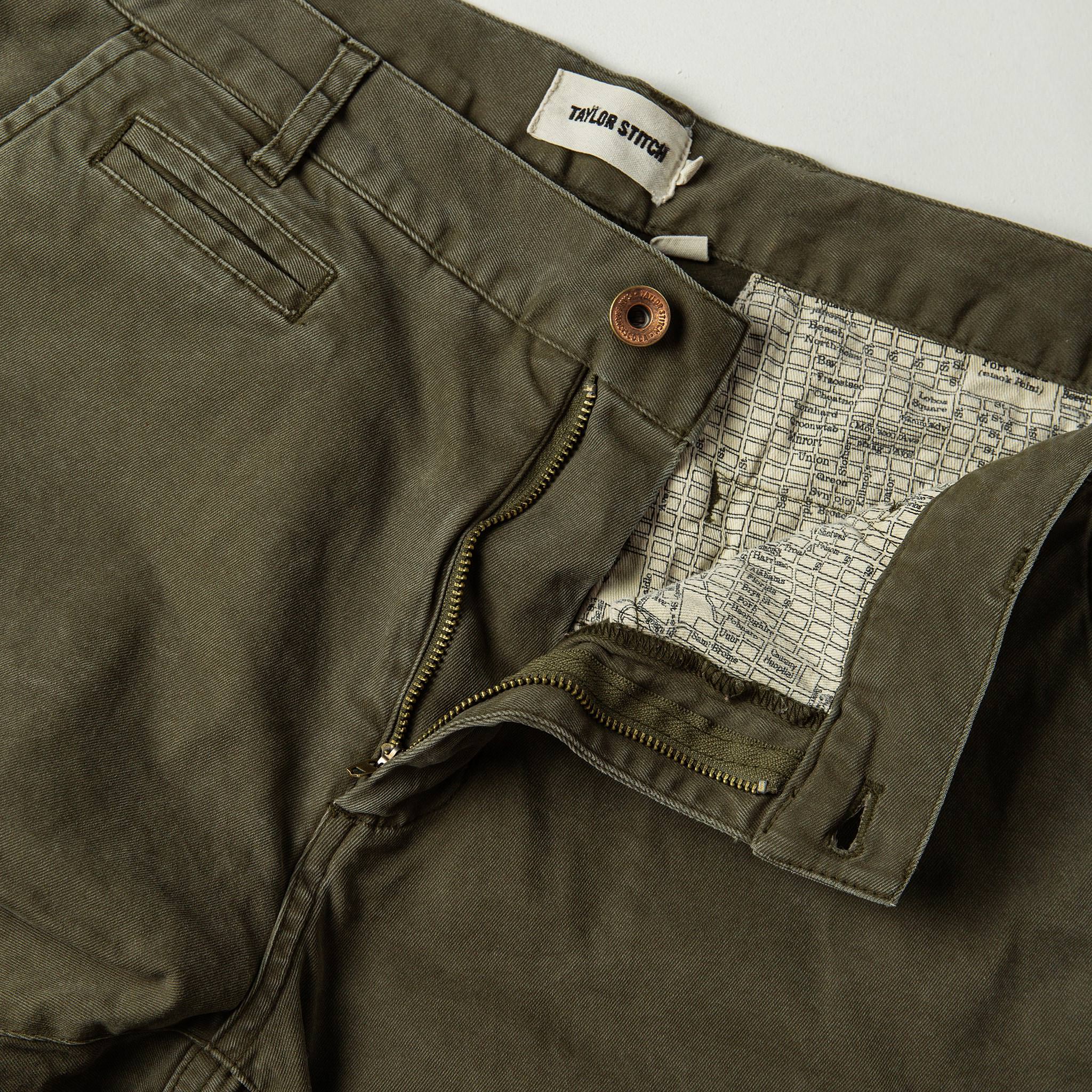 material shot of The Atelier and Repairs Chino in Olive, fly shot, Bottoms by Taylor Stitch