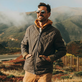 fit model wearing The Quilted Bomber Jacket in Espresso, hands in pockets, Outerwear by Taylor Stitch