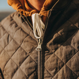 fit model wearing The Quilted Bomber Jacket in Espresso, zipper, Outerwear by Taylor Stitch