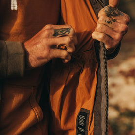 fit model wearing The Quilted Bomber Jacket in Espresso, interior, Outerwear by Taylor Stitch