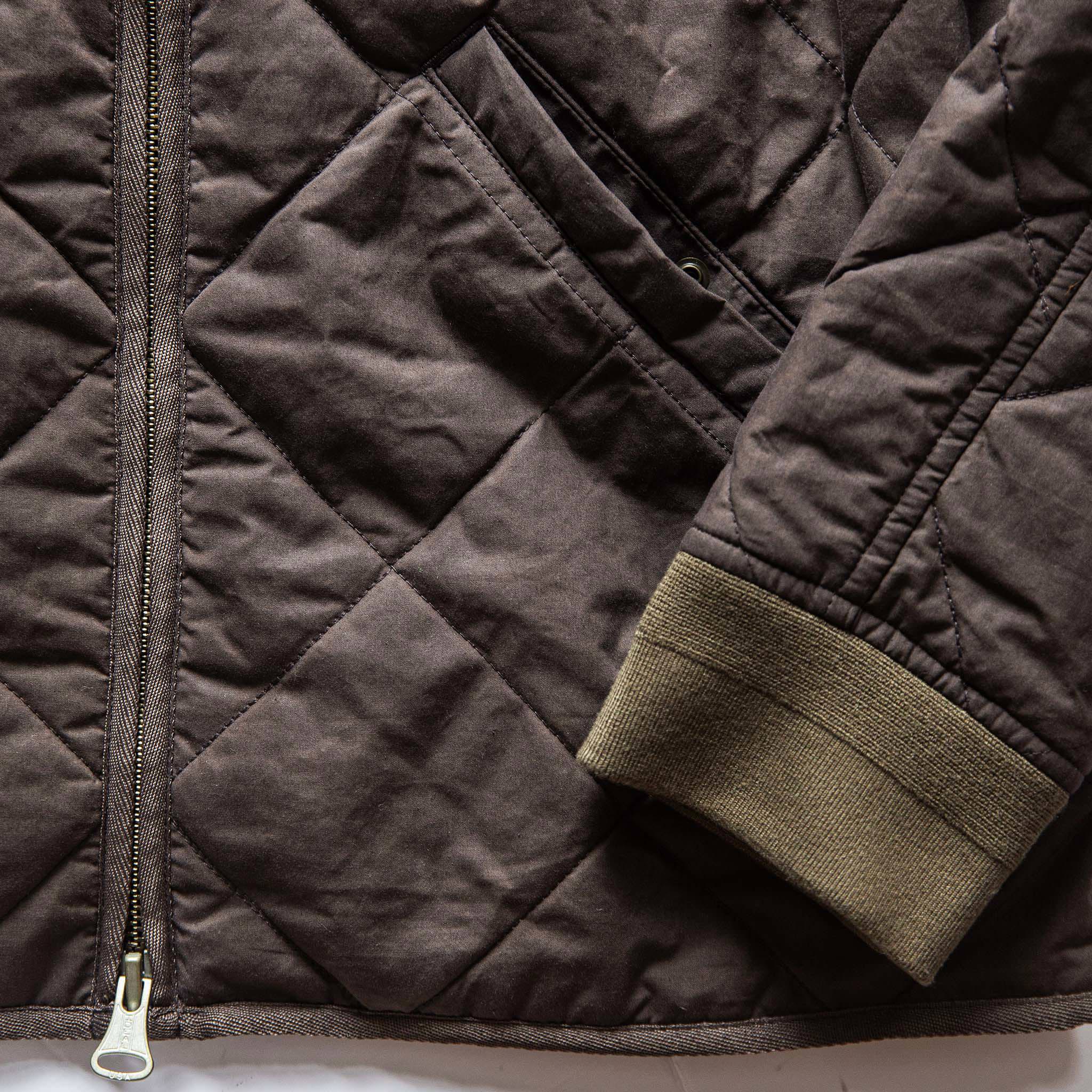 material shot of The Quilted Bomber Jacket in Espresso, front pocket and sleeve, Outerwear by Taylor Stitch