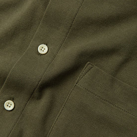 material shot of front pocket and buttons