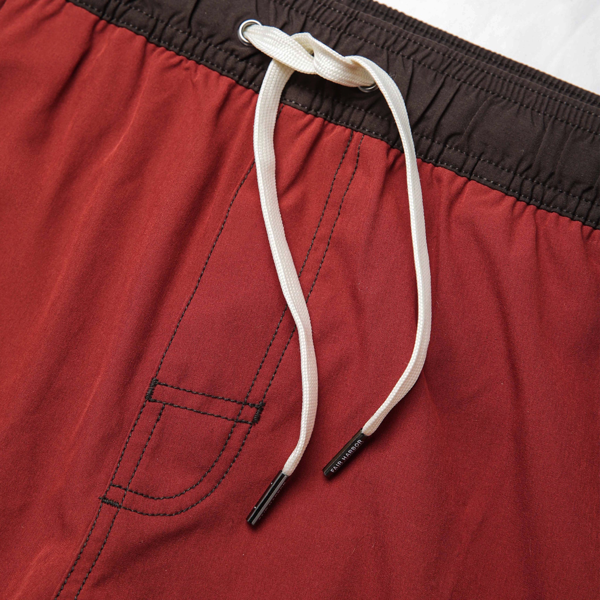 material shot of the drawcords on The Anchor Trunk in Red Clay, Bottoms by Taylor Stitch