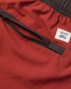 material shot of the back zipper pocket on The Anchor Trunk in Red Clay, Bottoms by Taylor Stitch