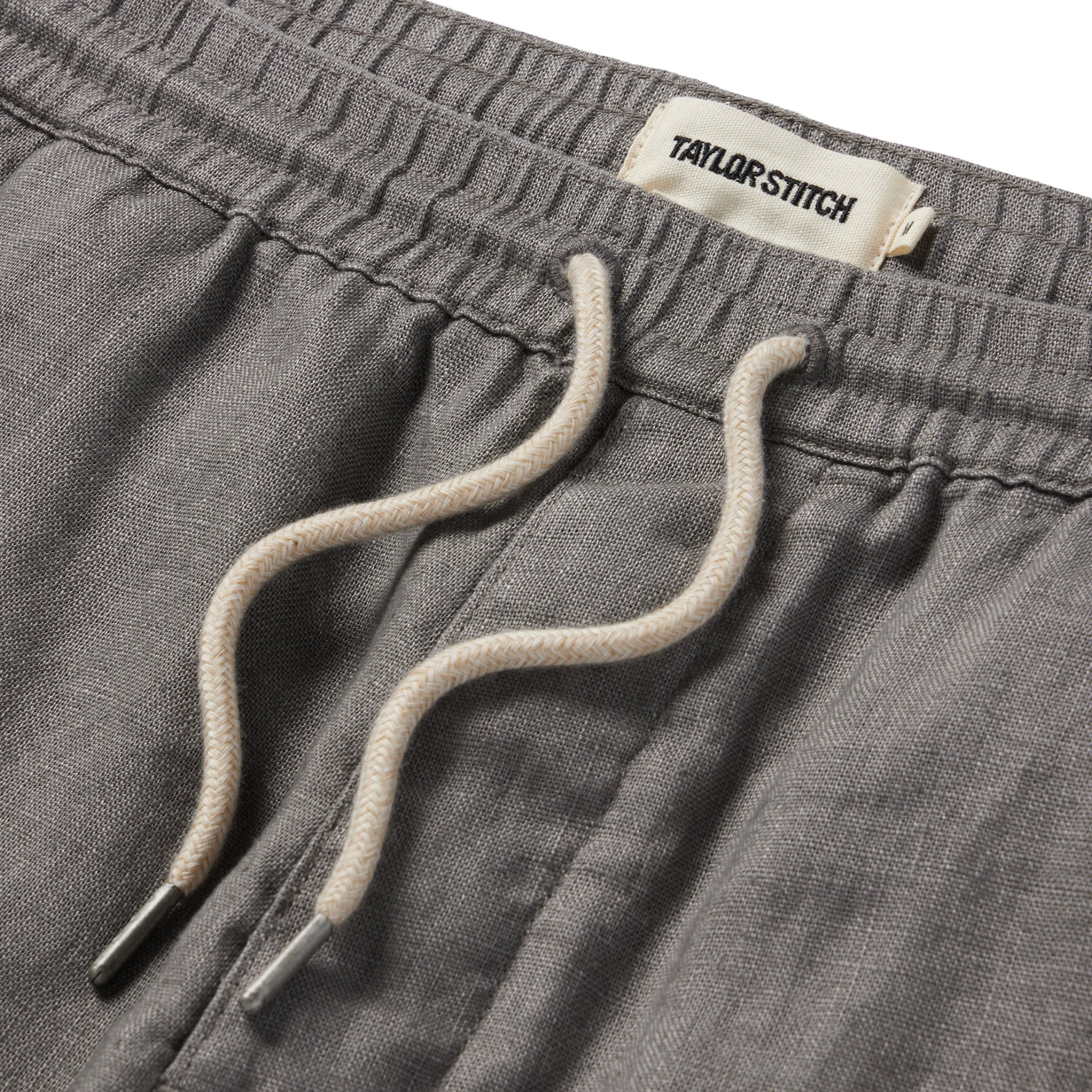 material shot of the drawcords on The Apres Short in Ash Hemp, Shorts by Taylor Stitch