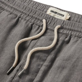 material shot of the drawcords on The Apres Short in Ash Hemp