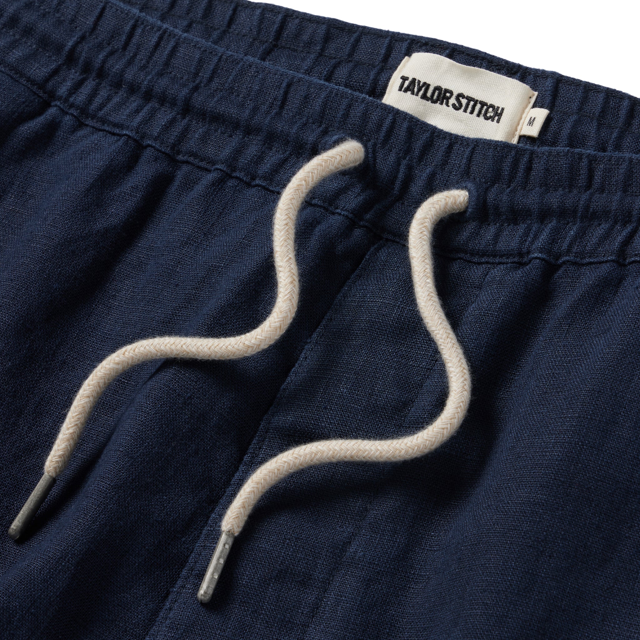 material shot of the drawcords on The Apres Short in Navy Hemp, Shorts by Taylor Stitch