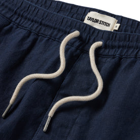 material shot of the drawcords on The Apres Short in Navy Hemp