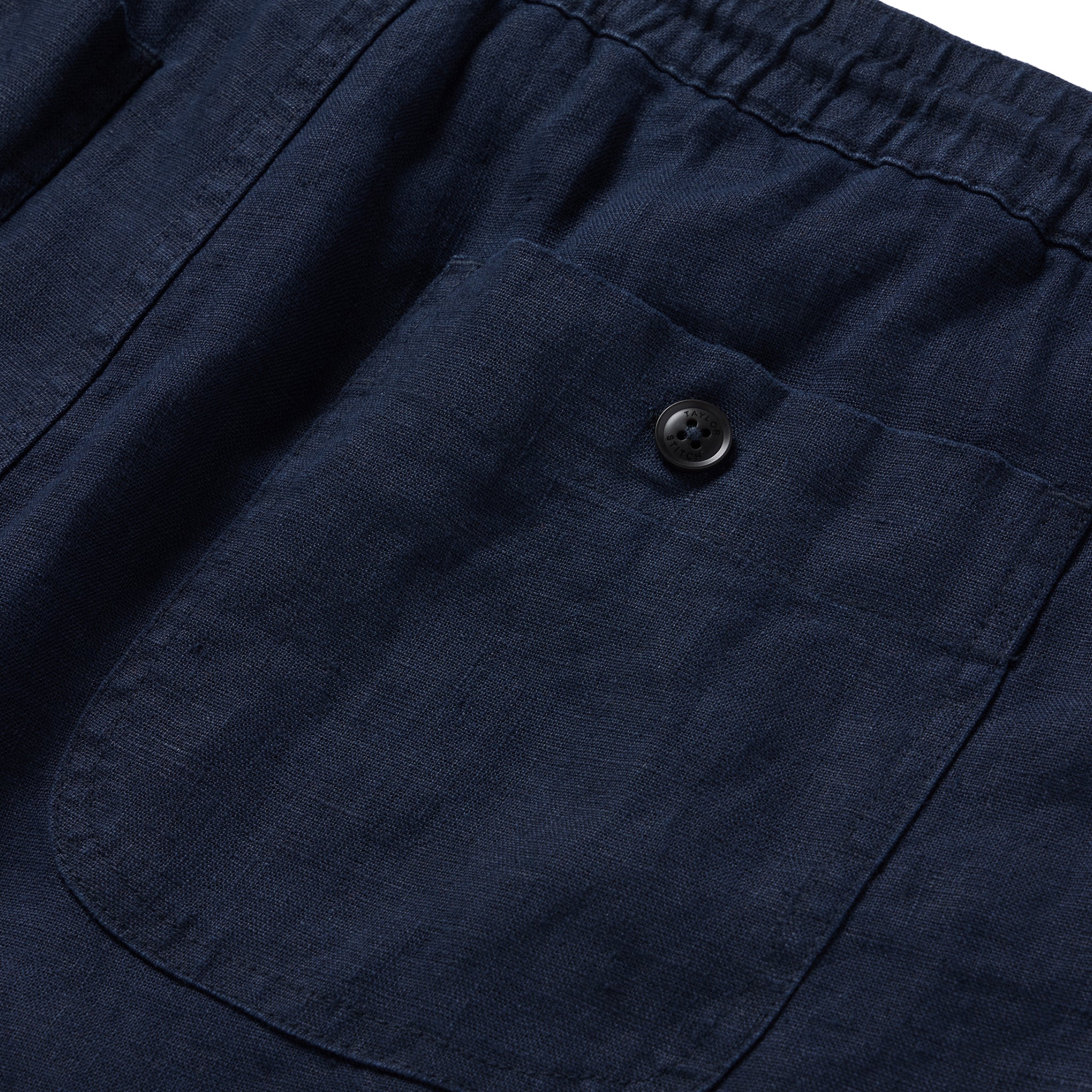 material shot of the rear pocket on The Apres Short in Navy Hemp, Shorts by Taylor Stitch