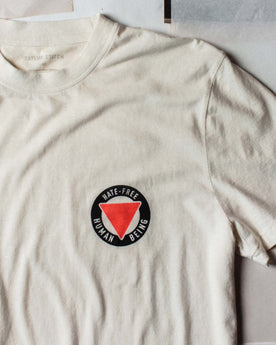 material shot of the graphic logo on The Cotton Hemp Tee in Hate-Free, Knits by Taylor Stitch