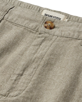 material shot of the button fly of The Easy Short in Olive Herringbone, Bottoms by Taylor Stitch