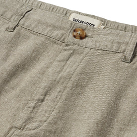 material shot of the button fly of The Easy Short in Olive Herringbone