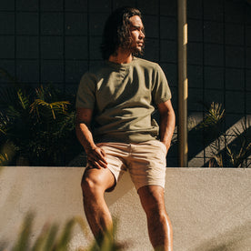 fit model sitting in The Foundation Short in Khaki Twill