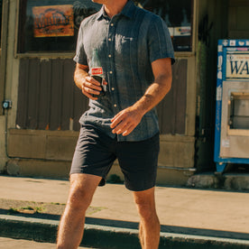 fit model walking in The Foundation Short in Navy Twill