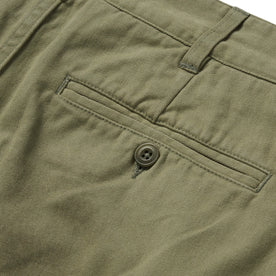material shot of the back pocket on The Foundation Short in Olive Twill