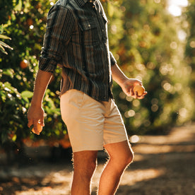 fit model showing the side of The Foundation Short in Natural Twill