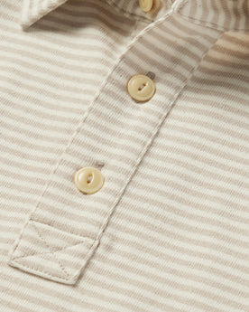 material shot of the buttons on The Heavy Bag Polo in Natural and Oatmeal Stripe, Knits by Taylor Stitch