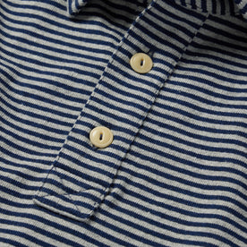 material shot of the buttons on The Heavy Bag Polo in Navy and Ash Stripe
