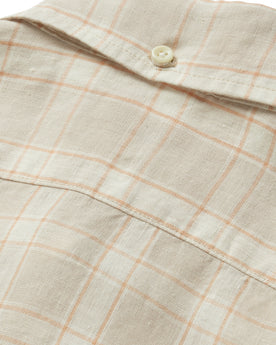 material shot of the back collar button on The Jack in Dune Plaid, Wovens by Taylor Stitch