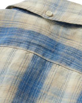 material shot of the back collar button on The Jack in Iceberg Plaid, Wovens by Taylor Stitch