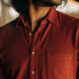 fit model showing the front of The Short Sleeve California in Red Clay Pique
