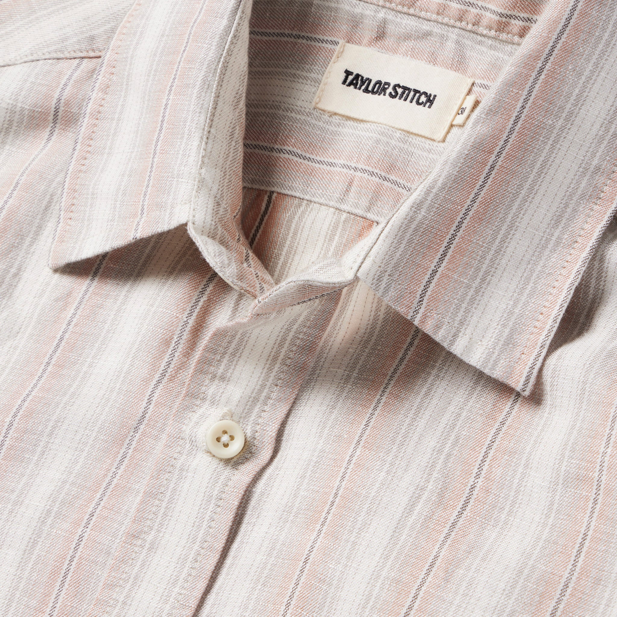 material shot of the collar of The Short Sleeve California in Dusty Rose Stripe, Wovens by Taylor Stitch