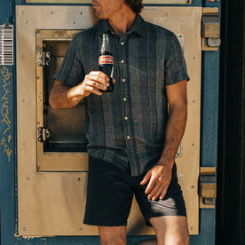 fit model posing in The Short Sleeve California in Dusk Stripe