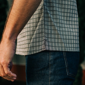 fit model standing in The Short Sleeve Hawthorne in Navy Stripe